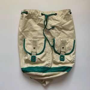 Cross body tan backpack